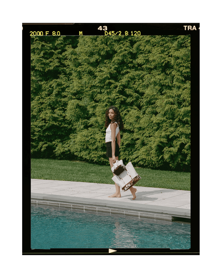 telluride totes next to pool on film